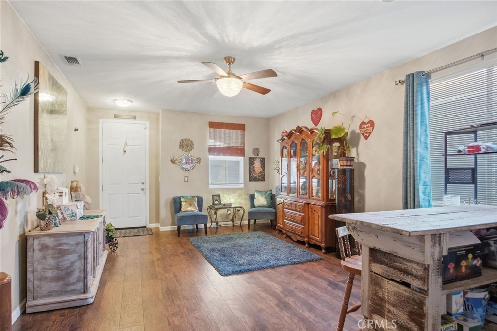 450 Beckman Way Merced, CA 95348 - Photo 6 of 22 a living room with furniture and wooden floor