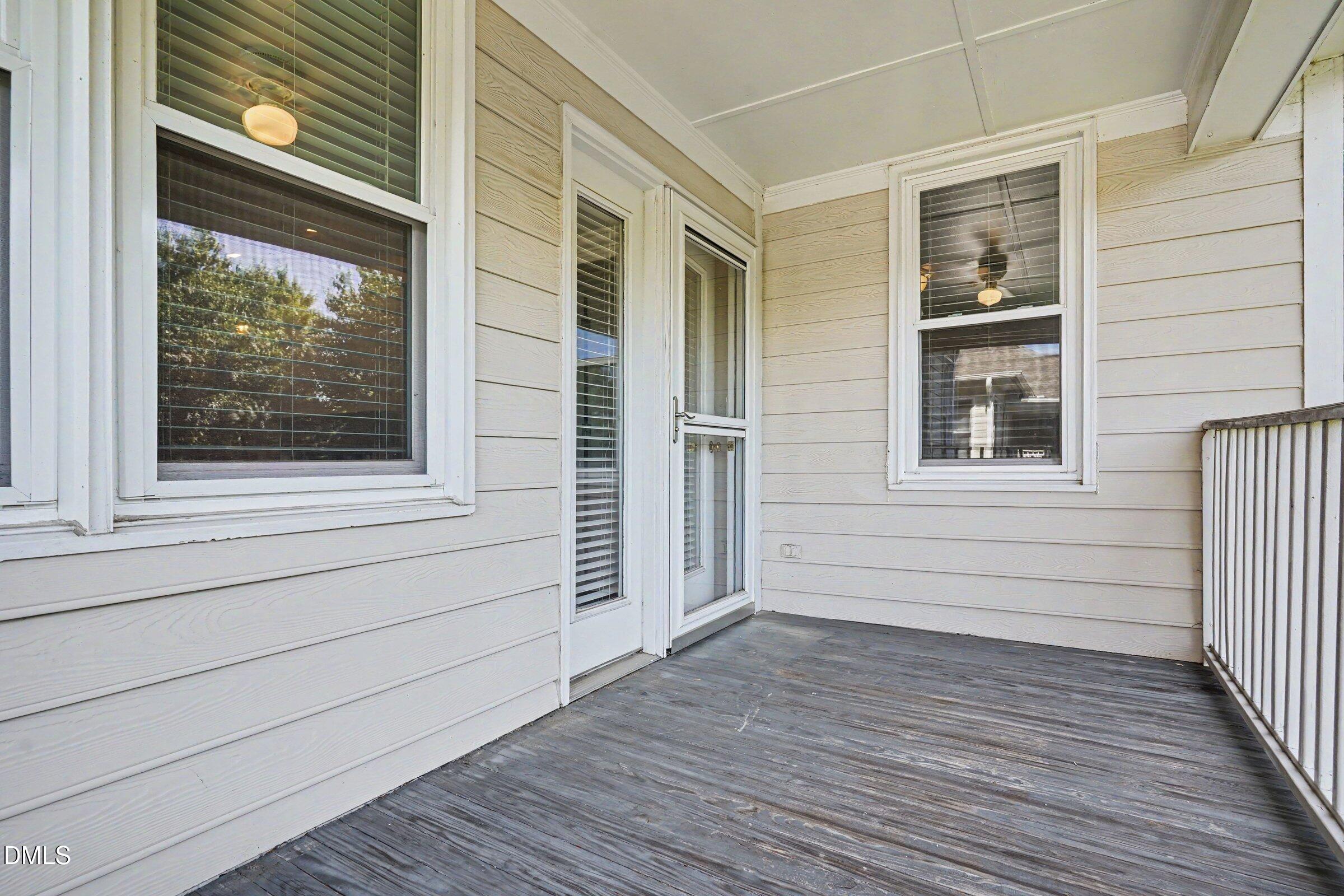 2651 Mellowfield Drive, Unit 203 Raleigh, NC 27604 - Photo 24 of 32 a view of a house with a door and wooden floor