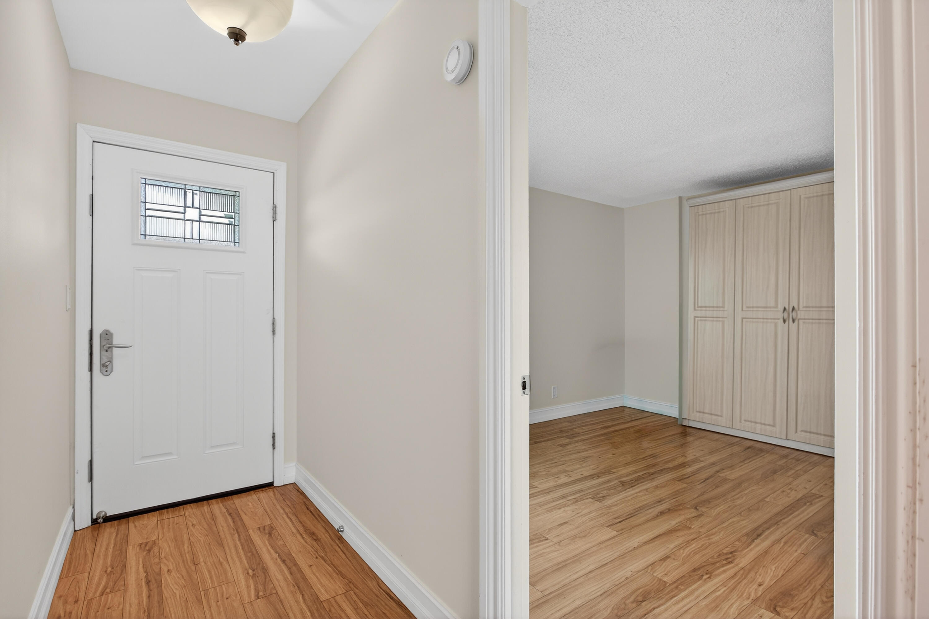 1631 Riverview Road, Unit 504 Deerfield Beach, FL 33441 - Photo 3 of 49 ENTRY & GUEST BEDROOM