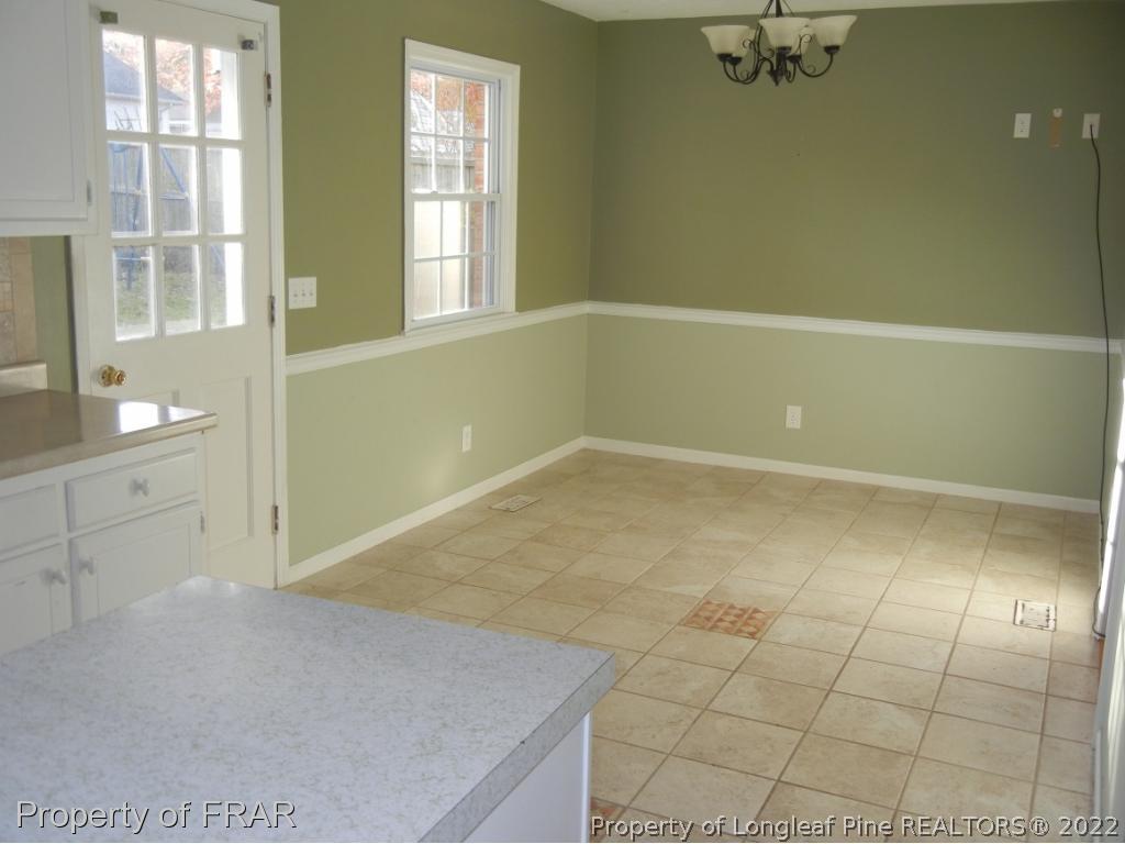 5630 Weatherford Road Fayetteville, NC 28303 - Photo 6 of 16 a view of empty room with window