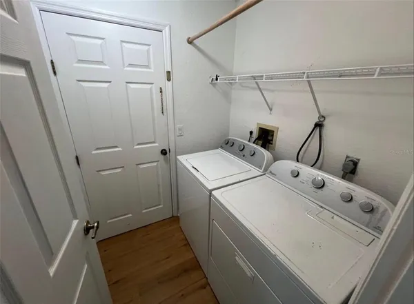 a utility room with dryer and washer