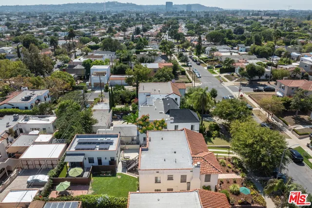 an aerial view of a city with lots of residential buildings