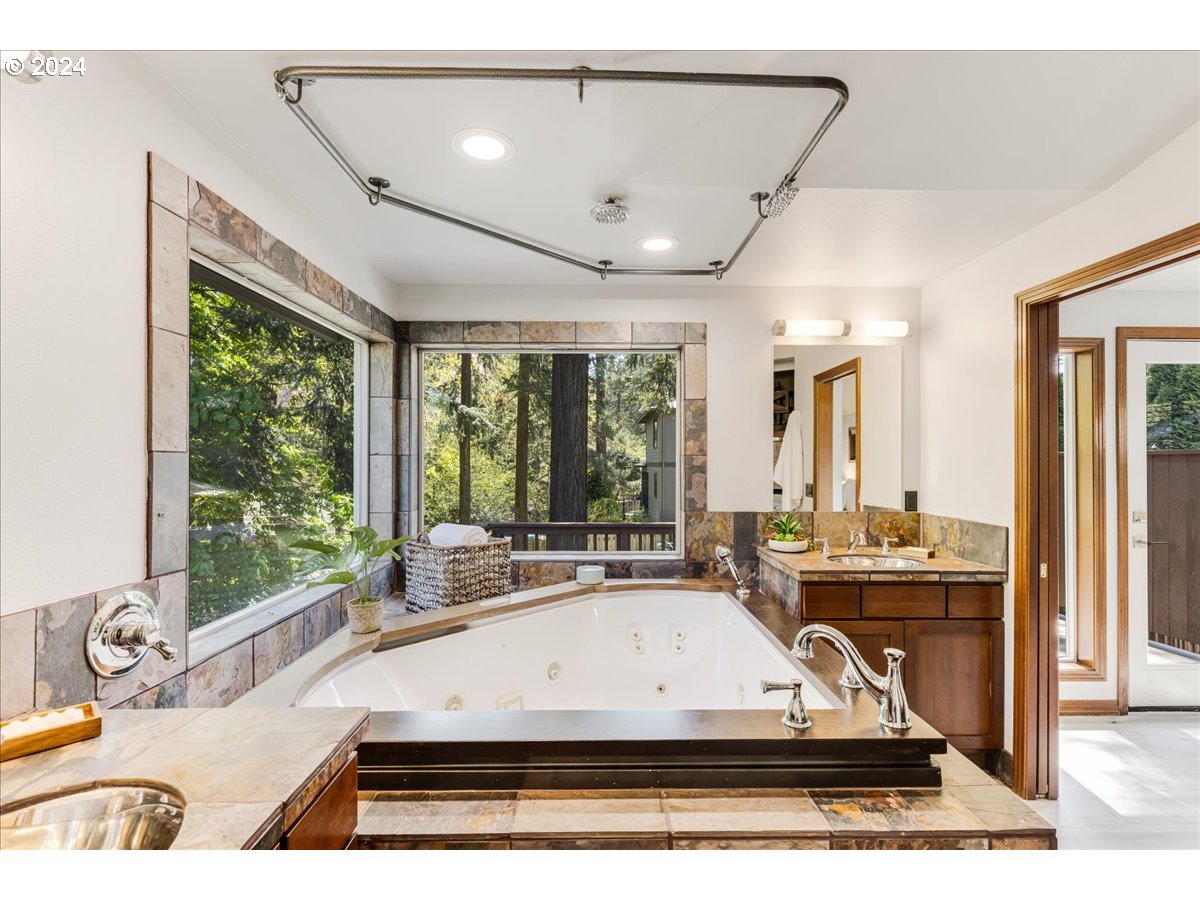 4820 Southwest Marigold Street Portland, OR 97219 - Photo 16 of 34 a view of swimming pool with furniture