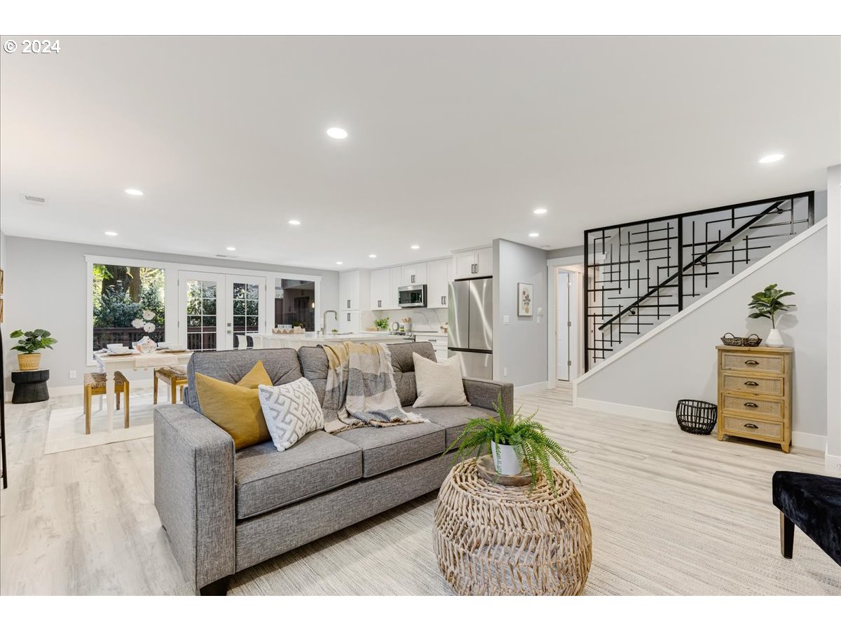 4820 Southwest Marigold Street Portland, OR 97219 - Photo 2 of 34 a living room with furniture and a table