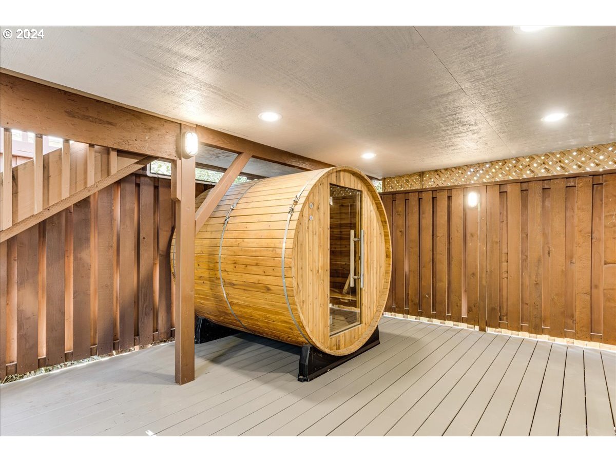 4820 Southwest Marigold Street Portland, OR 97219 - Photo 21 of 34 a view of a room with wooden walls