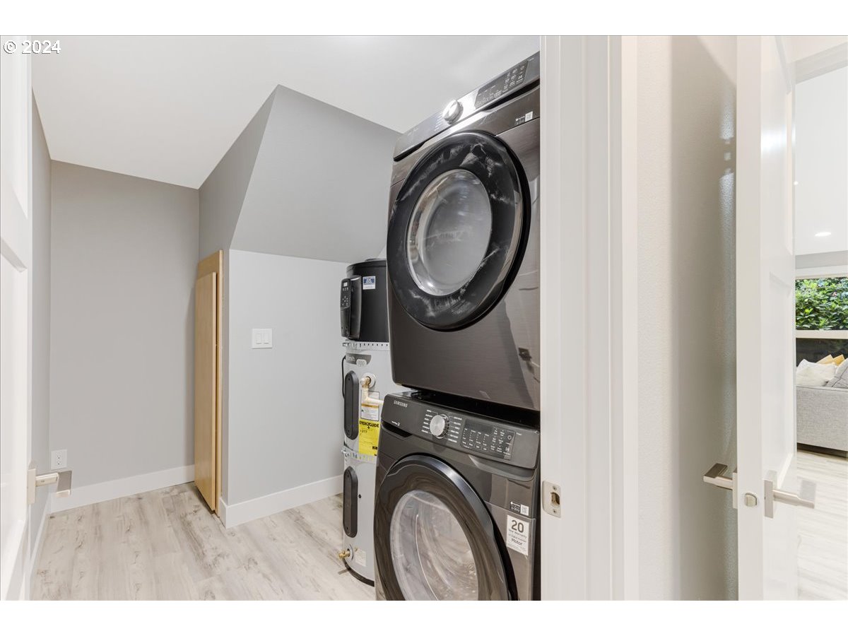 4820 Southwest Marigold Street Portland, OR 97219 - Photo 26 of 34 a utility room with dryer and washer