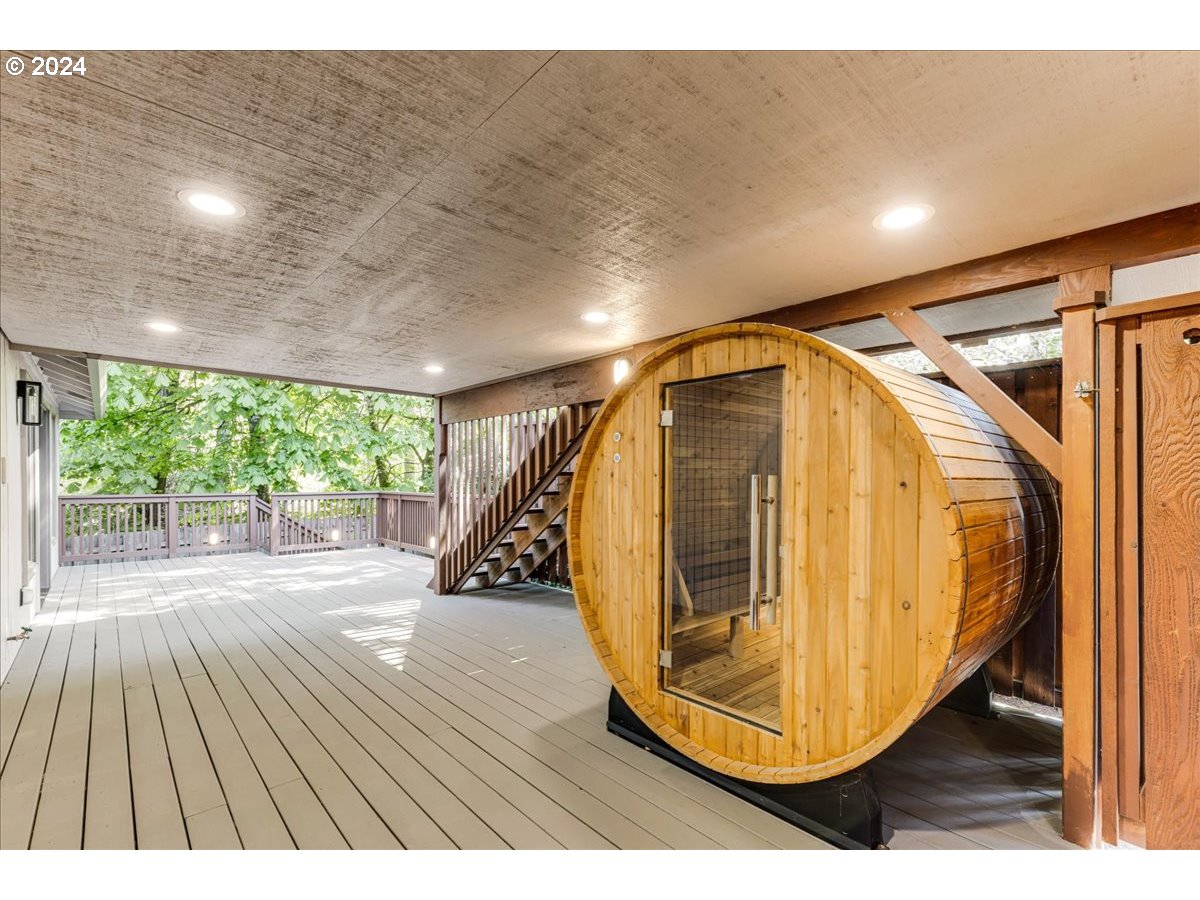 4820 Southwest Marigold Street Portland, OR 97219 - Photo 27 of 34 a view of entryway with wooden floor