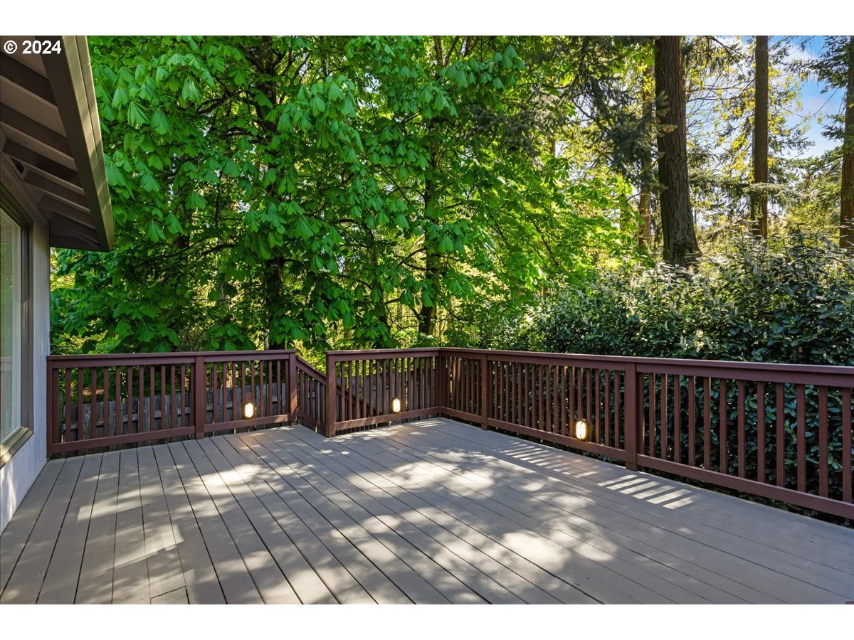 4820 Southwest Marigold Street Portland, OR 97219 - Photo 28 of 34 a view of balcony with wooden floor