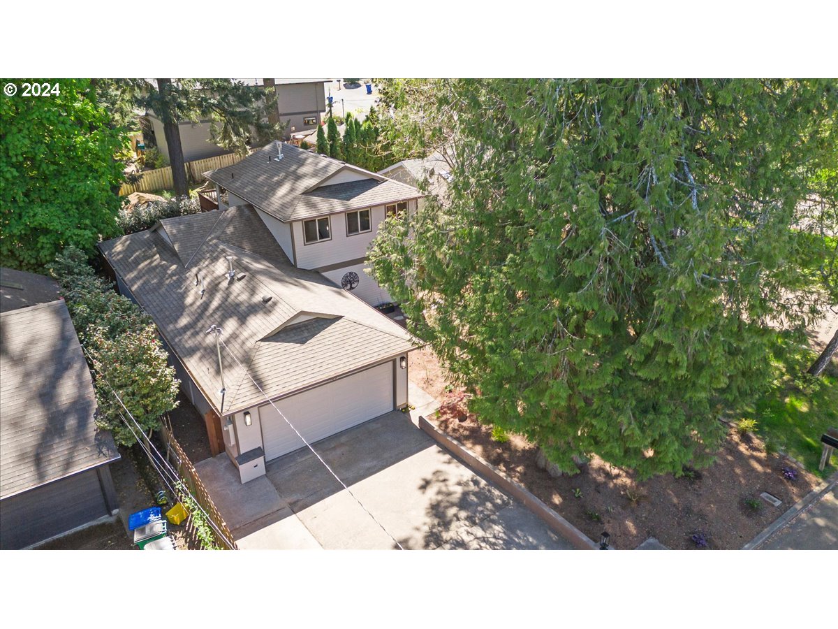 4820 Southwest Marigold Street Portland, OR 97219 - Photo 33 of 34 a picture of a person on a street