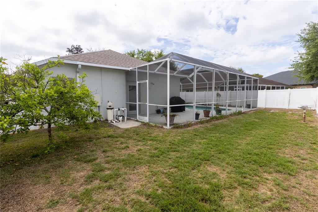 1812 Flower Branch Way Valrico, FL 33594 - Photo 41 of 42 a view of a house with a yard and sitting area