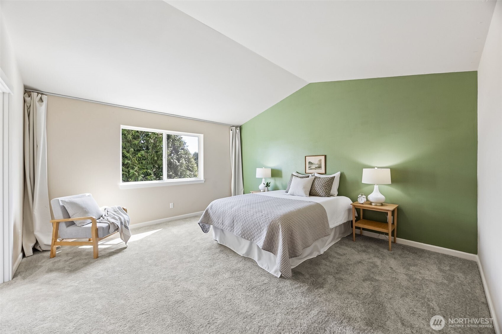 4703 Prestwick Lane Southeast Lacey, WA 98513 - Photo 21 of 40 a bedroom with a bed and a chair