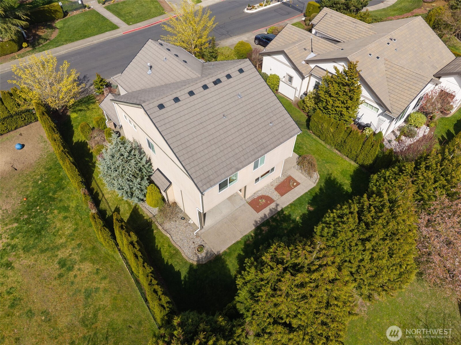 4703 Prestwick Lane Southeast Lacey, WA 98513 - Photo 35 of 40 an aerial view of a house with a yard