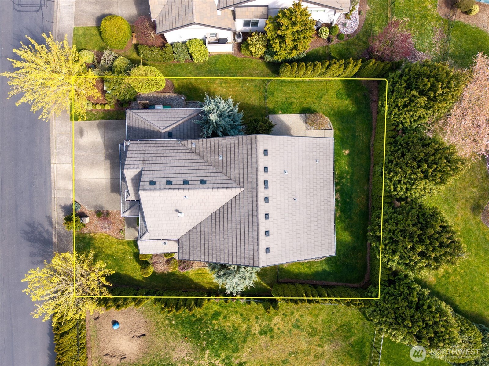 4703 Prestwick Lane Southeast Lacey, WA 98513 - Photo 36 of 40 an aerial view of a house with a swimming pool