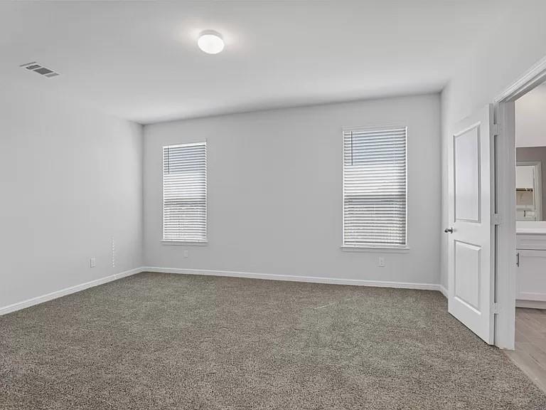5229 Boulder Vly Drive Fort Worth, TX 76179 - Photo 12 of 39 an empty room with windows