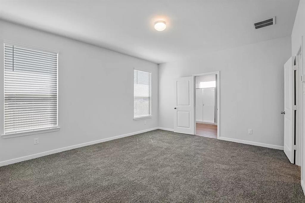 5229 Boulder Vly Drive Fort Worth, TX 76179 - Photo 15 of 39 an empty room with windows