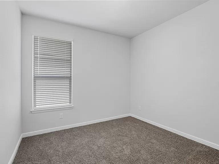 5229 Boulder Vly Drive Fort Worth, TX 76179 - Photo 22 of 39 an empty room with a window