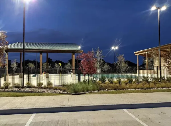 a view of a building with a street