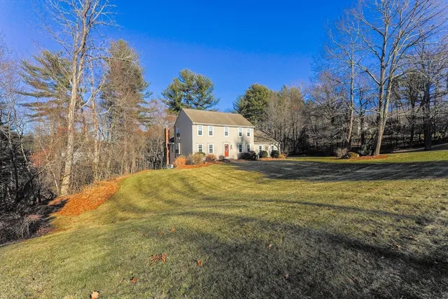 a view of a room with a white walls and a window