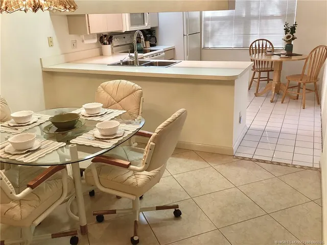 a kitchen with a stove and cabinets