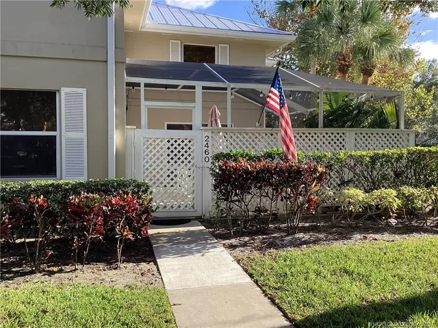 a view of a backyard with plants