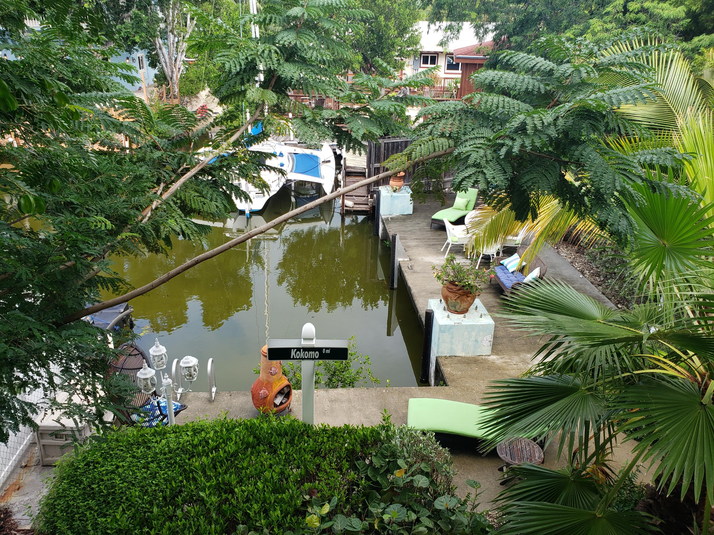 102 Mockingbird Road Tavernier, FL 33070 - Photo 14 of 17 an aerial view of multiple houses with yard