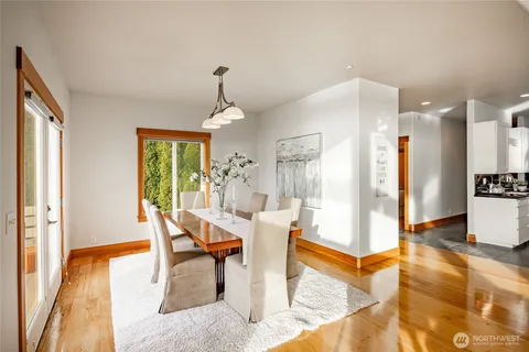 a view of a livingroom with furniture and wooden floor