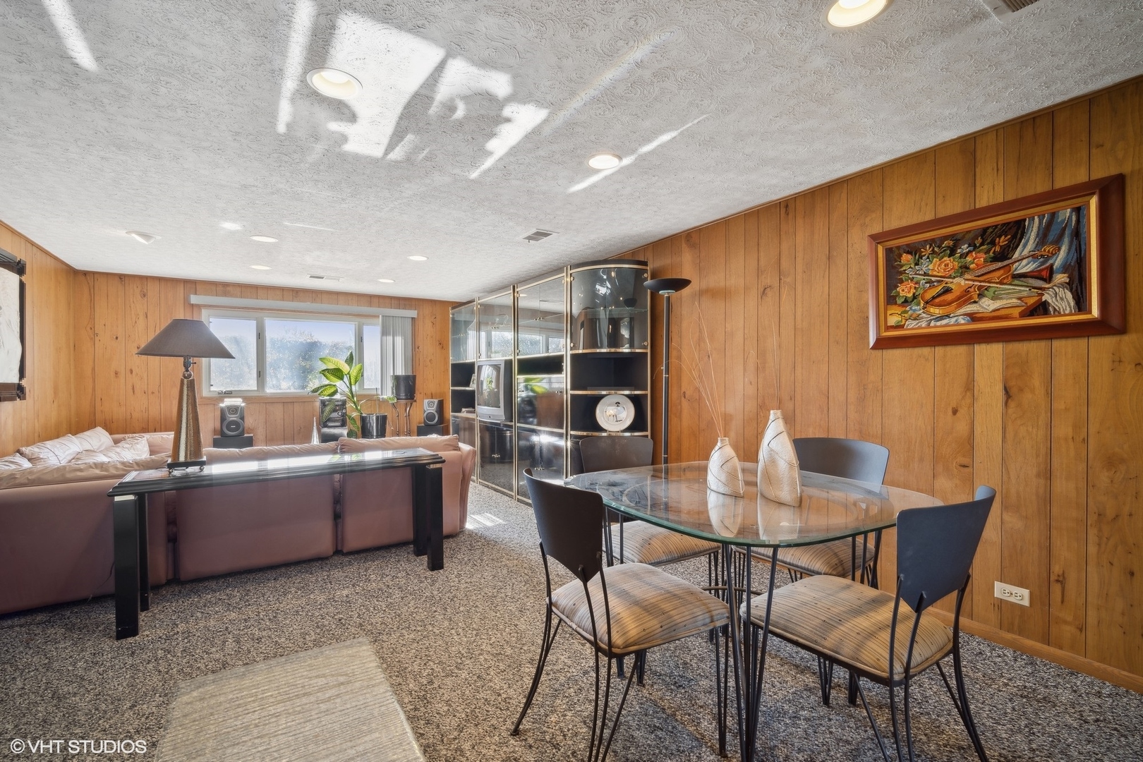 7933 Beckwith Road Morton Grove, IL 60053 - Photo 14 of 32 a view of a dining room with furniture and chandelier
