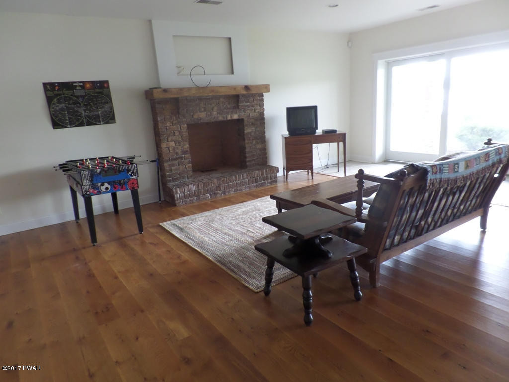 130-135 Spinnler Point Road Tafton, PA 18464 - Photo 18 of 48 Main House-Lower Level Family Room