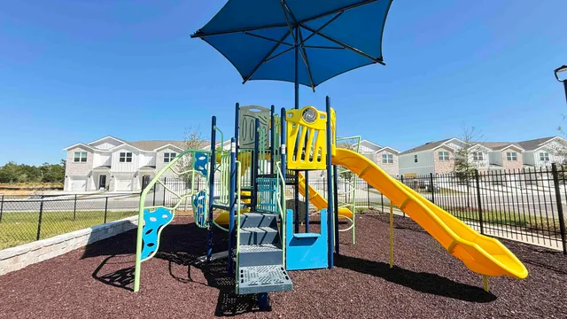a view of swimming pool with sitting area
