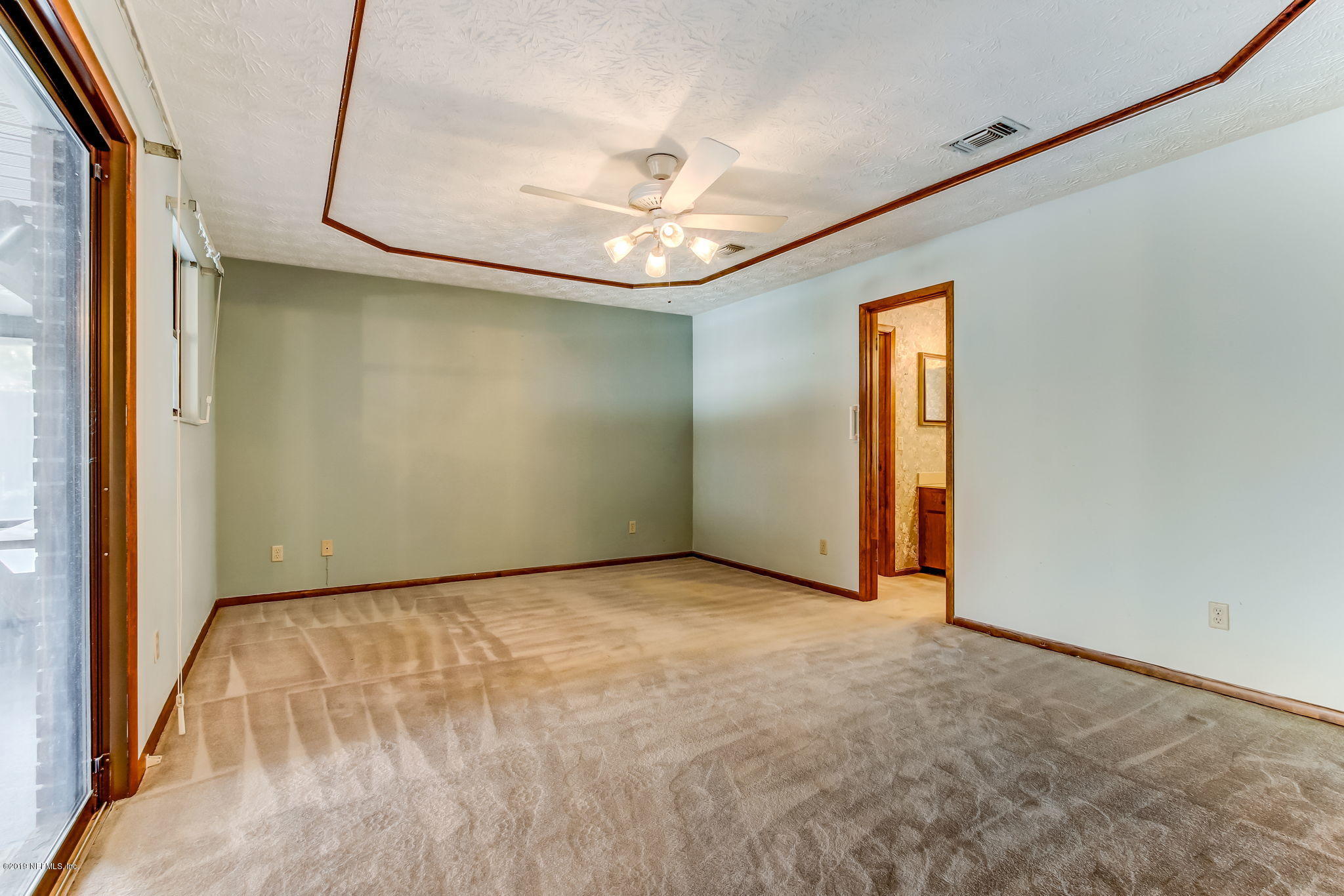 5898 Swamp Fox Road Jacksonville, FL 32210 - Photo 17 of 33 Master bedroom