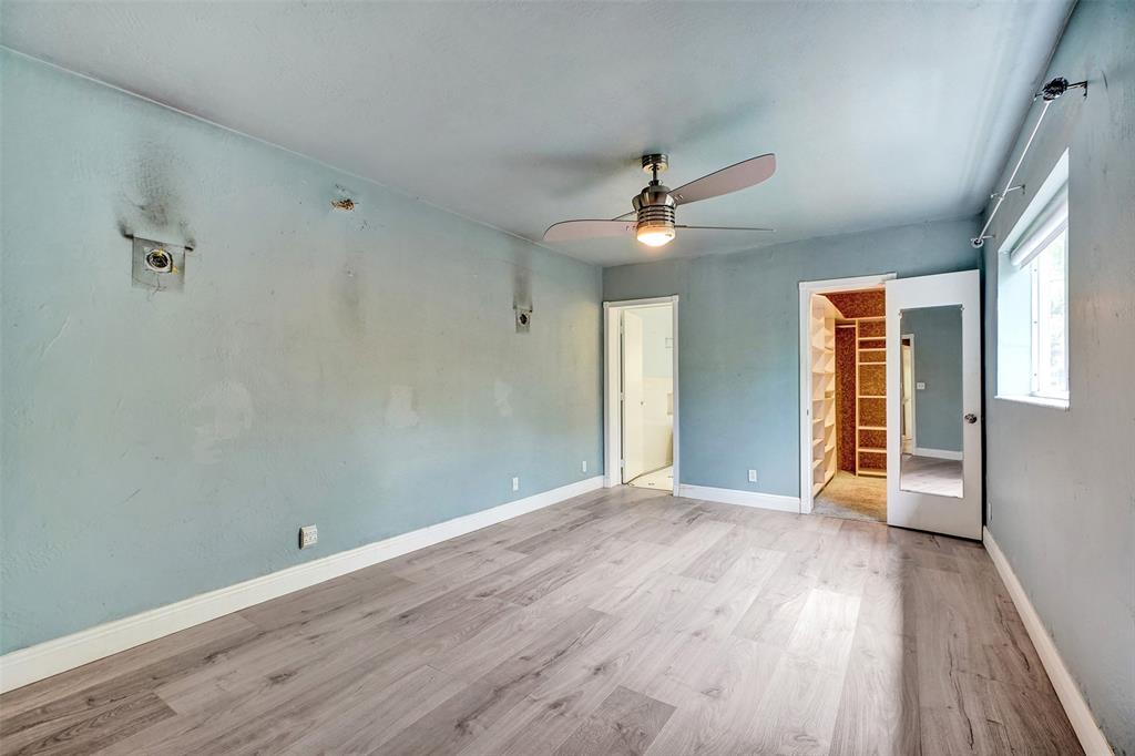 1626 Tyler Street Hollywood, FL 33020 - Photo 13 of 28 wooden floor in an empty room with a window