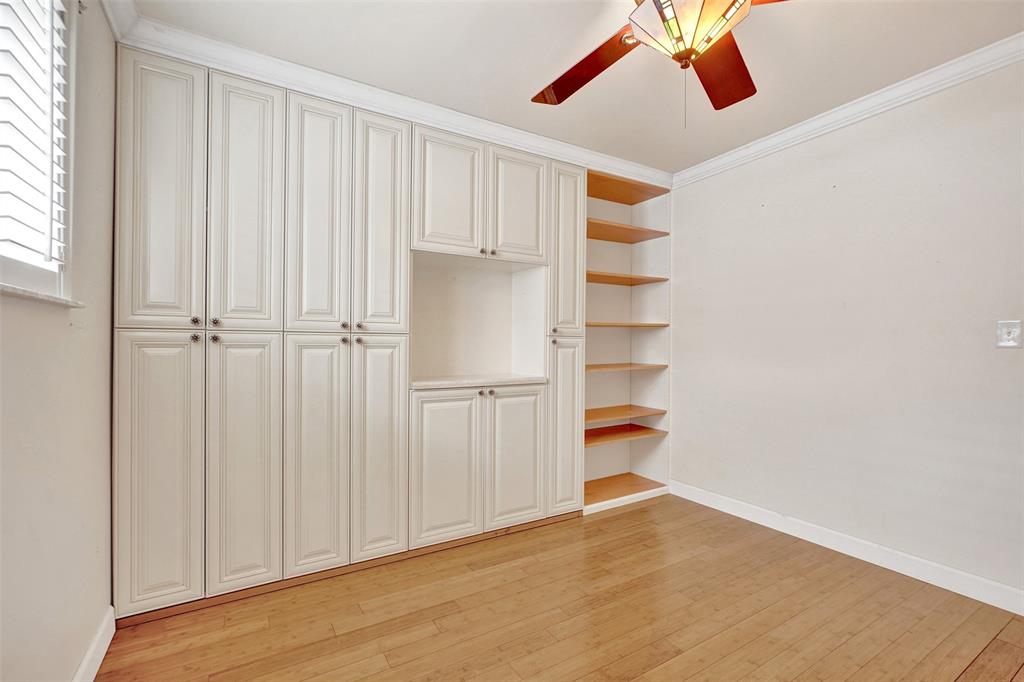 1626 Tyler Street Hollywood, FL 33020 - Photo 19 of 28 a view of an empty room with a ceiling fan