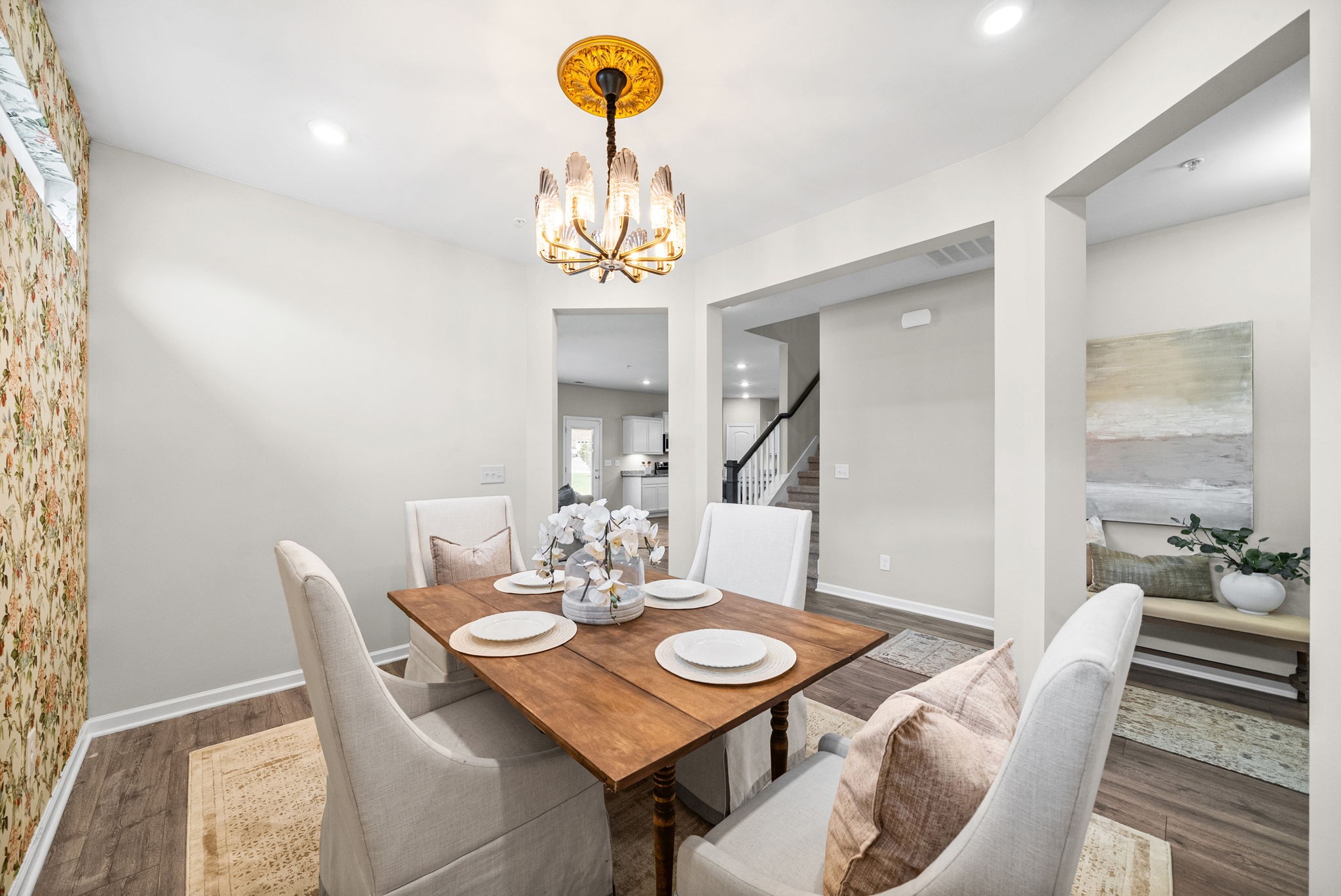 719 Reflections Lane Pleasant View, TN 37146 - Photo 8 of 46 a view of a dining room with furniture wooden floor and chandelier