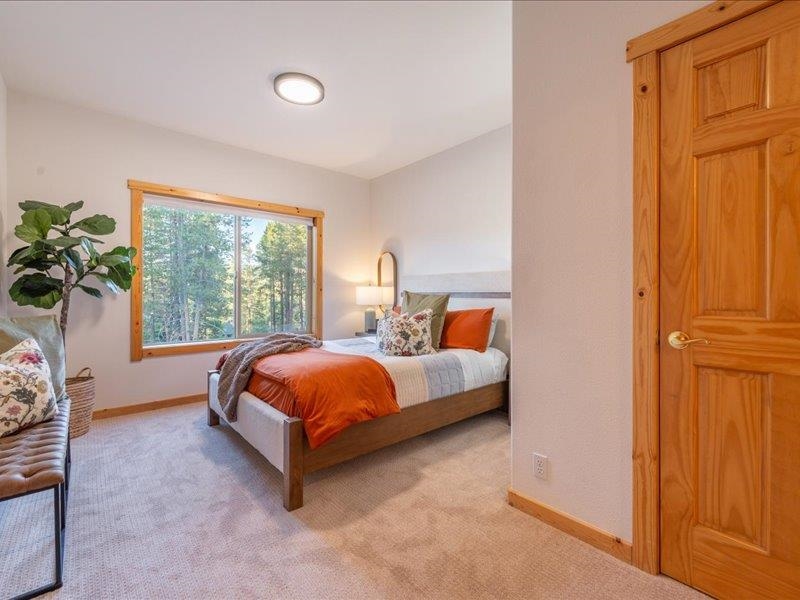 12678 Hidden Circle, Unit 4 Truckee, CA 96161 - Photo 18 of 28 a bed room with a bed and a window