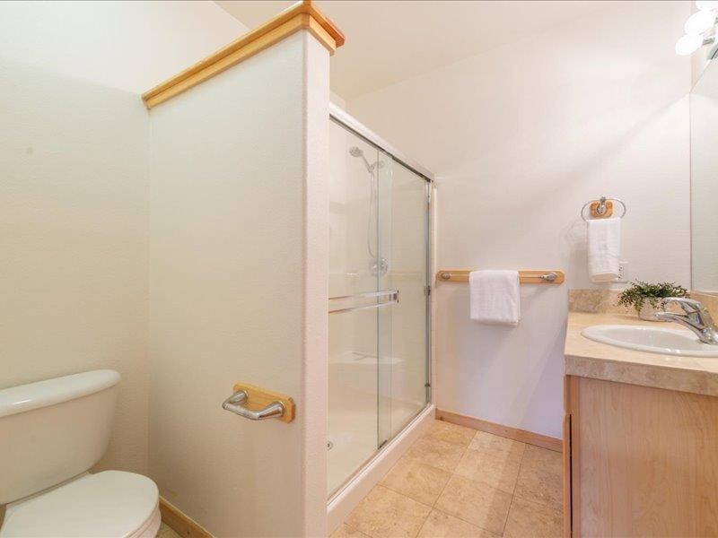 12678 Hidden Circle, Unit 4 Truckee, CA 96161 - Photo 20 of 28 a bathroom with a sink a toilet and shower