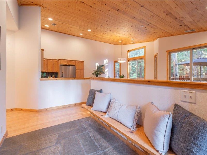 12678 Hidden Circle, Unit 4 Truckee, CA 96161 - Photo 6 of 28 a living room with furniture and a large window