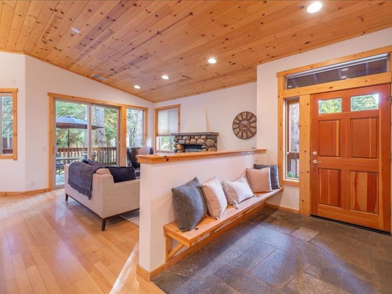 12678 Hidden Circle, Unit 4 Truckee, CA 96161 - Photo 7 of 28 a living room with furniture and a large window