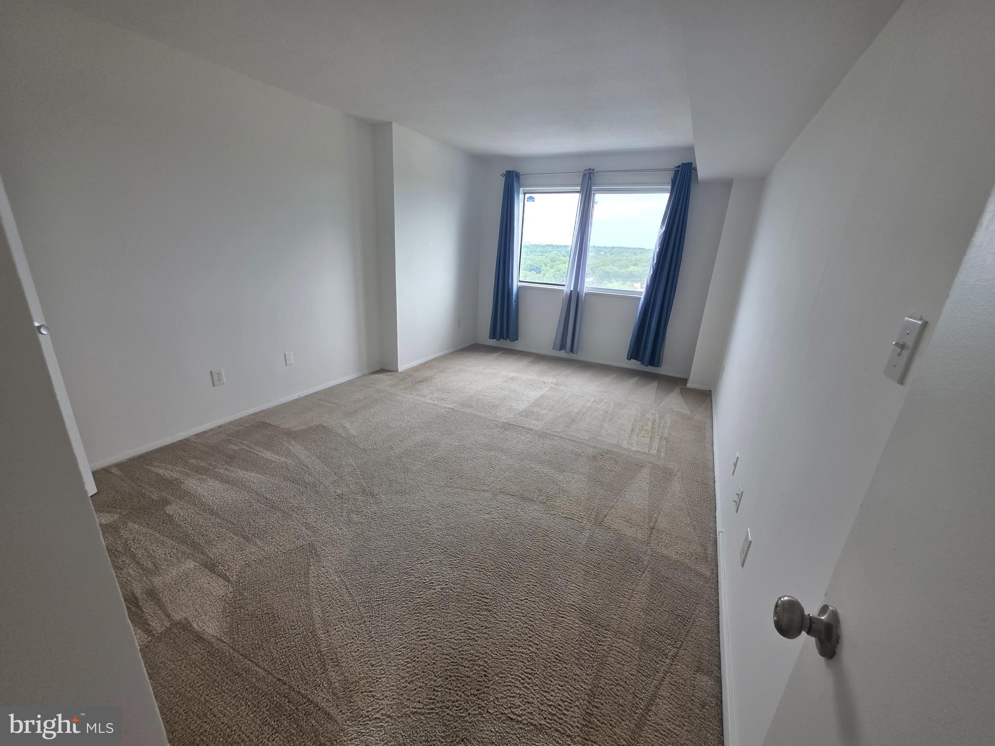 1836 Metzerott Road, Unit 1704 Adelphi, MD 20783 - Photo 37 of 47 a view of empty room with windows