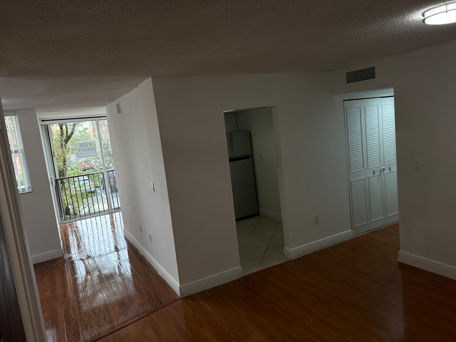 9441 Southwest 4th Street, Unit 202 Miami, FL 33174 - Photo 11 of 21 a view of entryway with wooden floor