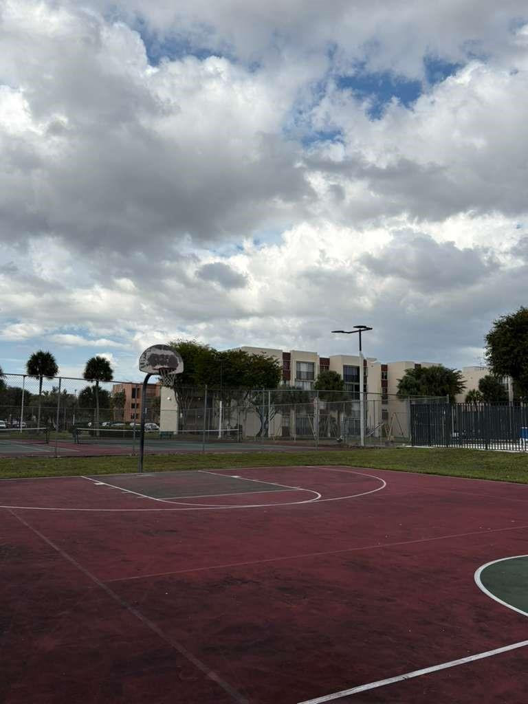 9441 Southwest 4th Street, Unit 202 Miami, FL 33174 - Photo 18 of 21 a view of basketball court