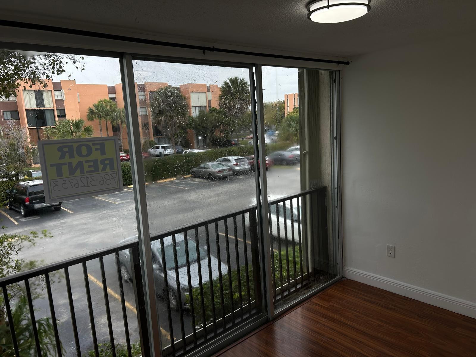 9441 Southwest 4th Street, Unit 202 Miami, FL 33174 - Photo 4 of 21 a view of a porch