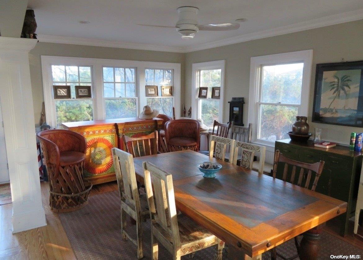 860 Ocean View Walk Ocean Beach, NY 11770 - Photo 3 of 14 a view of a dining room with furniture window and outside view