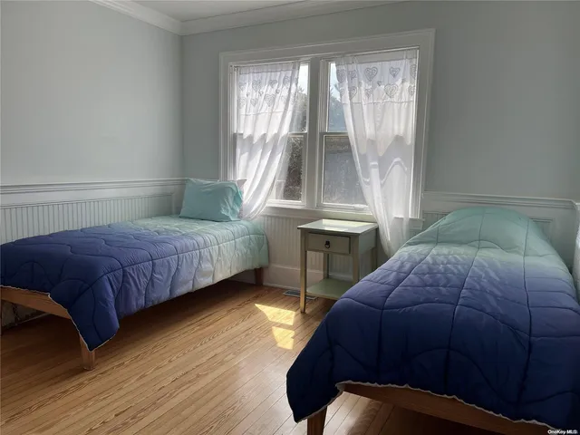a bedroom with a bed and a table