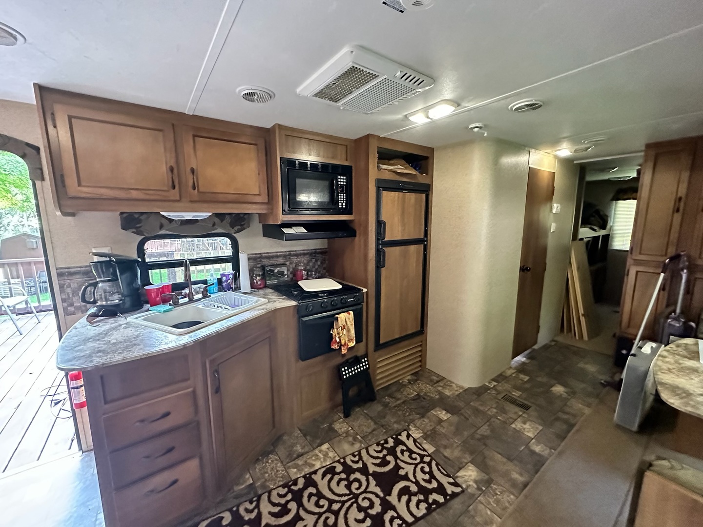 2795 East 28th Road Marseilles, IL 61341 - Photo 11 of 11 a kitchen with a refrigerator and a sink