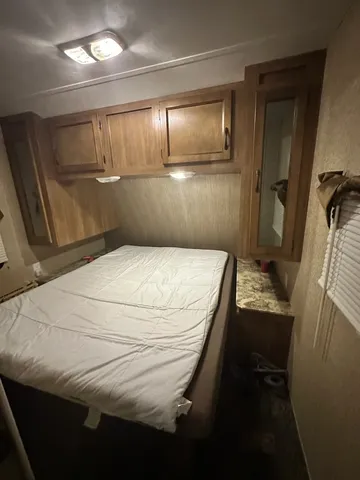 a bathroom with a sink and mirror