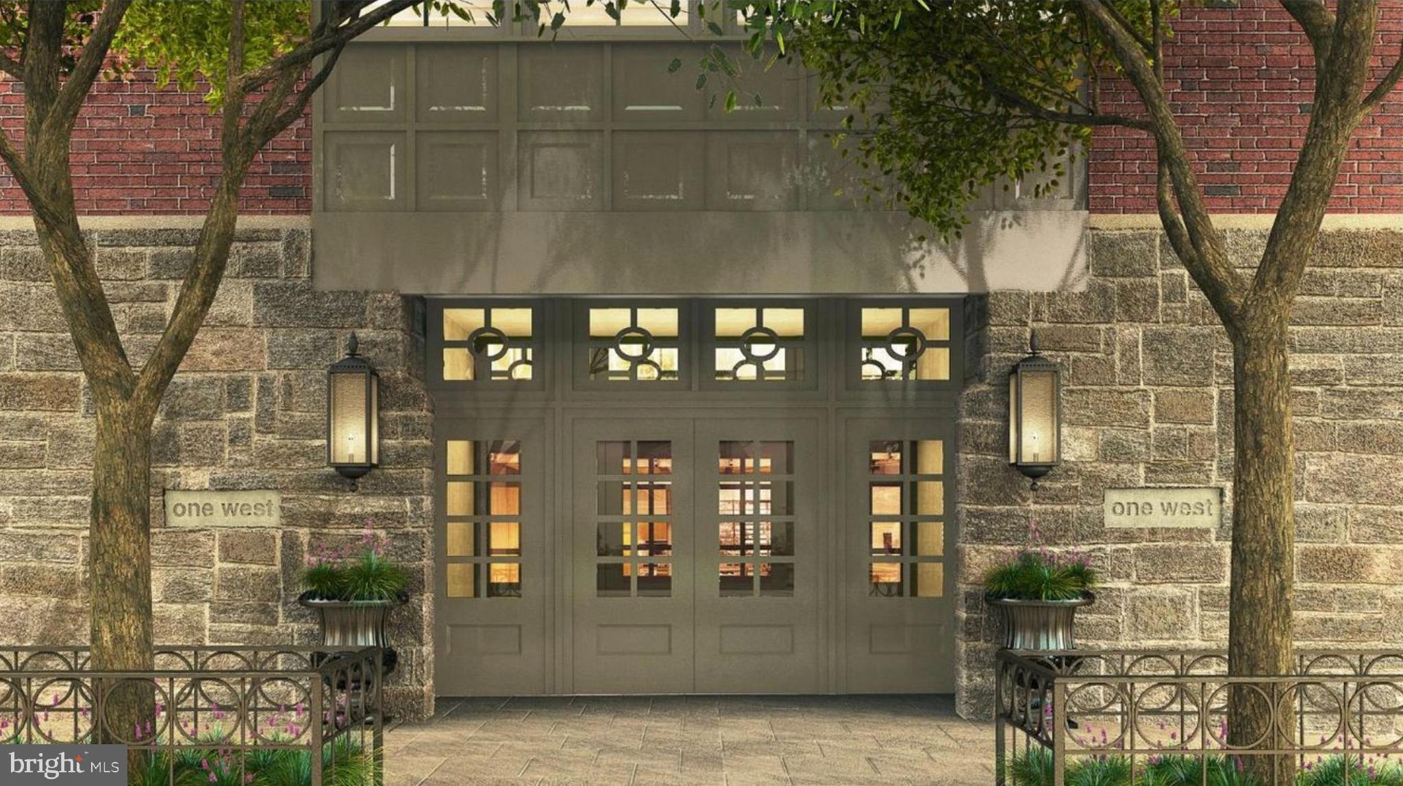 1 West Hartwell Lane, Unit 3C Philadelphia, PA 19118 - Photo 5 of 6 a front view of a building with glass windows and door