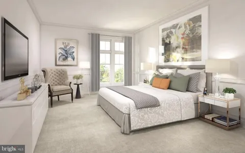 a bed room with a bed and a couch