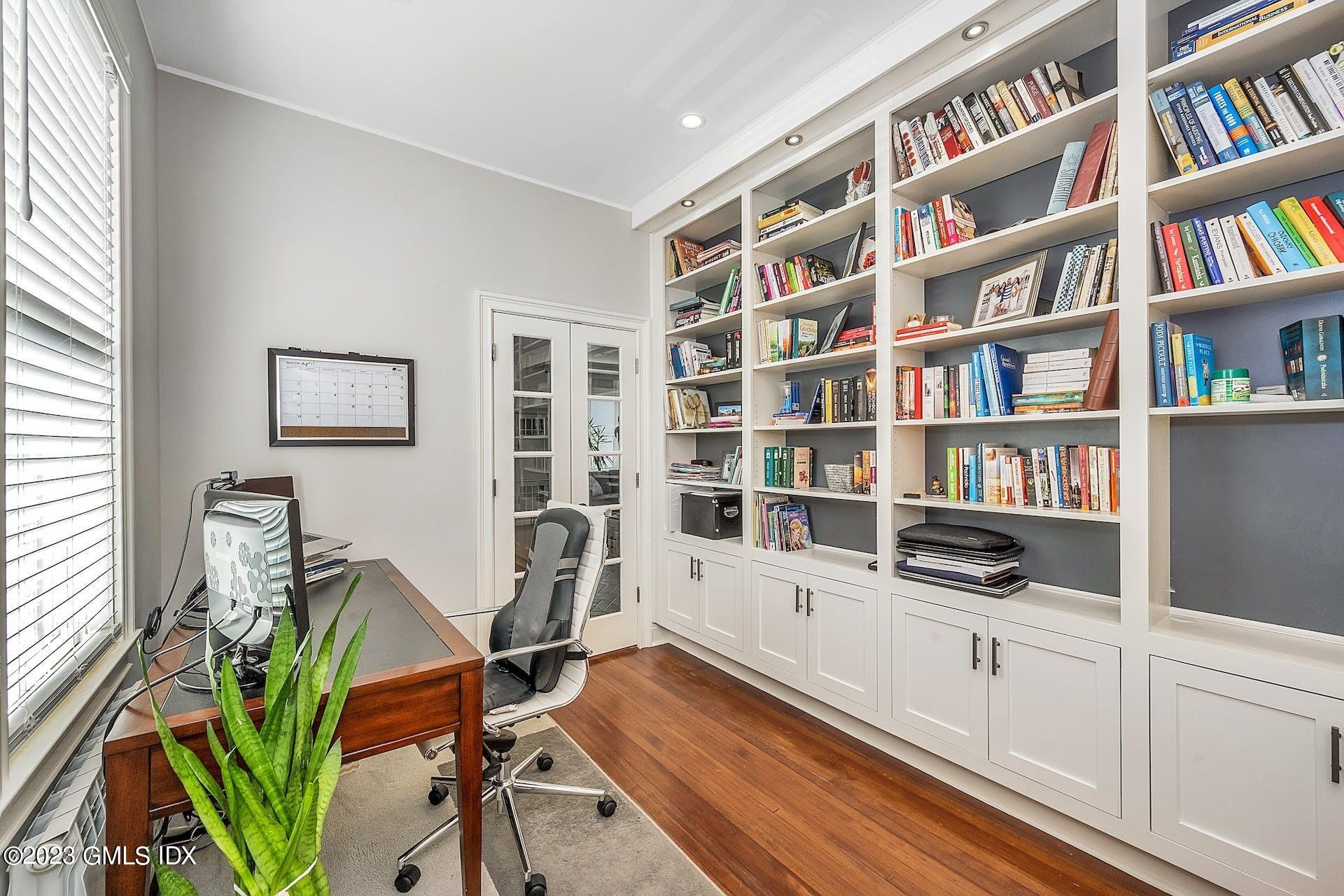 58 Upland Road Stamford, CT 06906 - Photo 13 of 32 a view of a workspace with furniture and toys