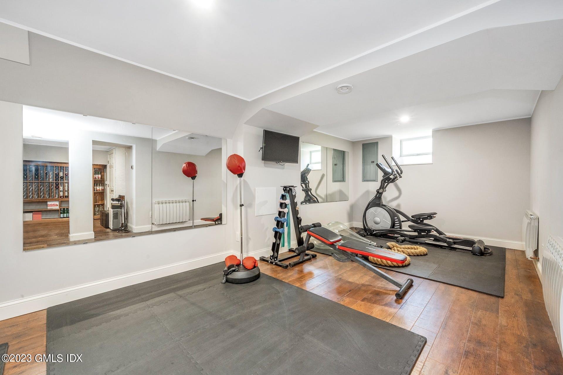 58 Upland Road Stamford, CT 06906 - Photo 25 of 32 a view of a room with gym equipment
