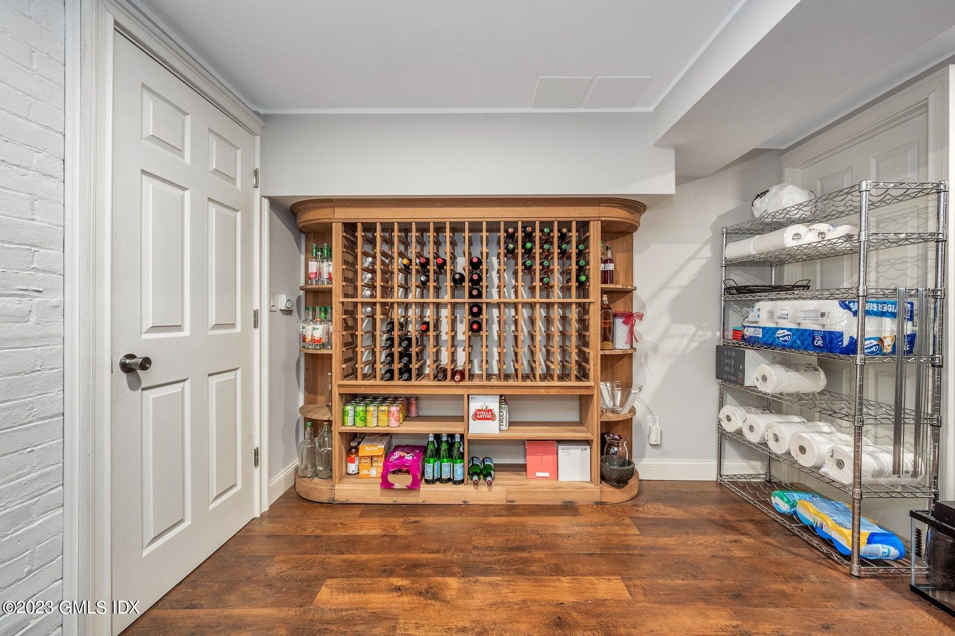 58 Upland Road Stamford, CT 06906 - Photo 26 of 32 a view of an entryway with hardwood